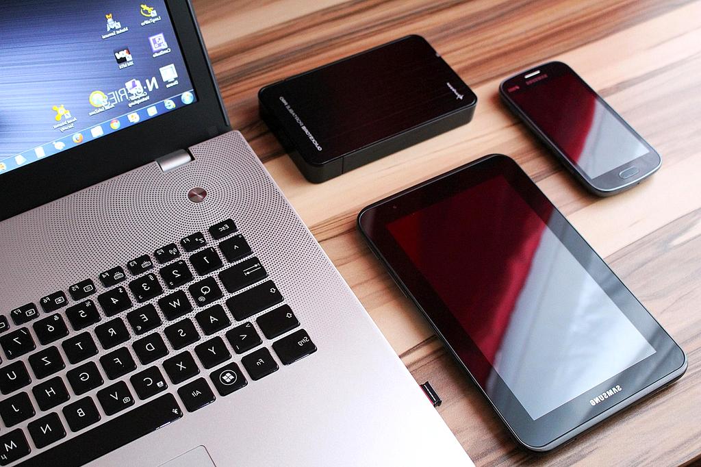 Internal components of a hard disk drive showing platters and read/write heads